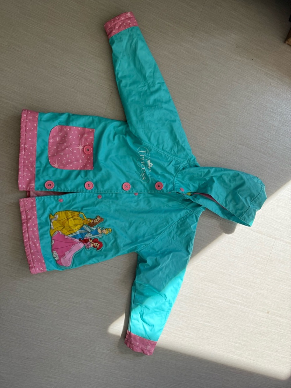 Western Chief Turquoise Hooded Raincoat with Pink Trim and Princess Graphic